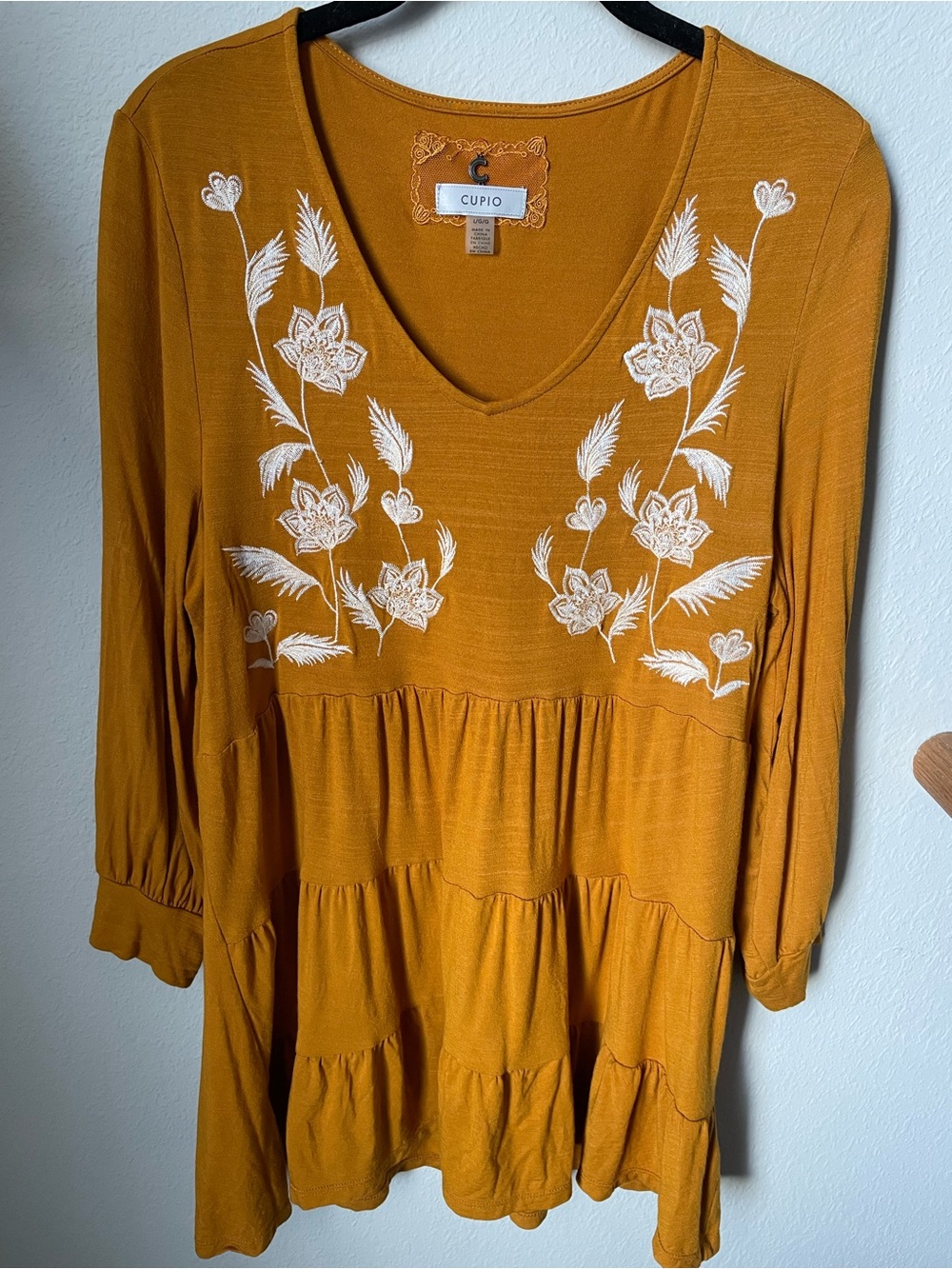 Cupio Mustard 3/4 Sleeve V‑Neck Tiered Top with White Floral Embroidery